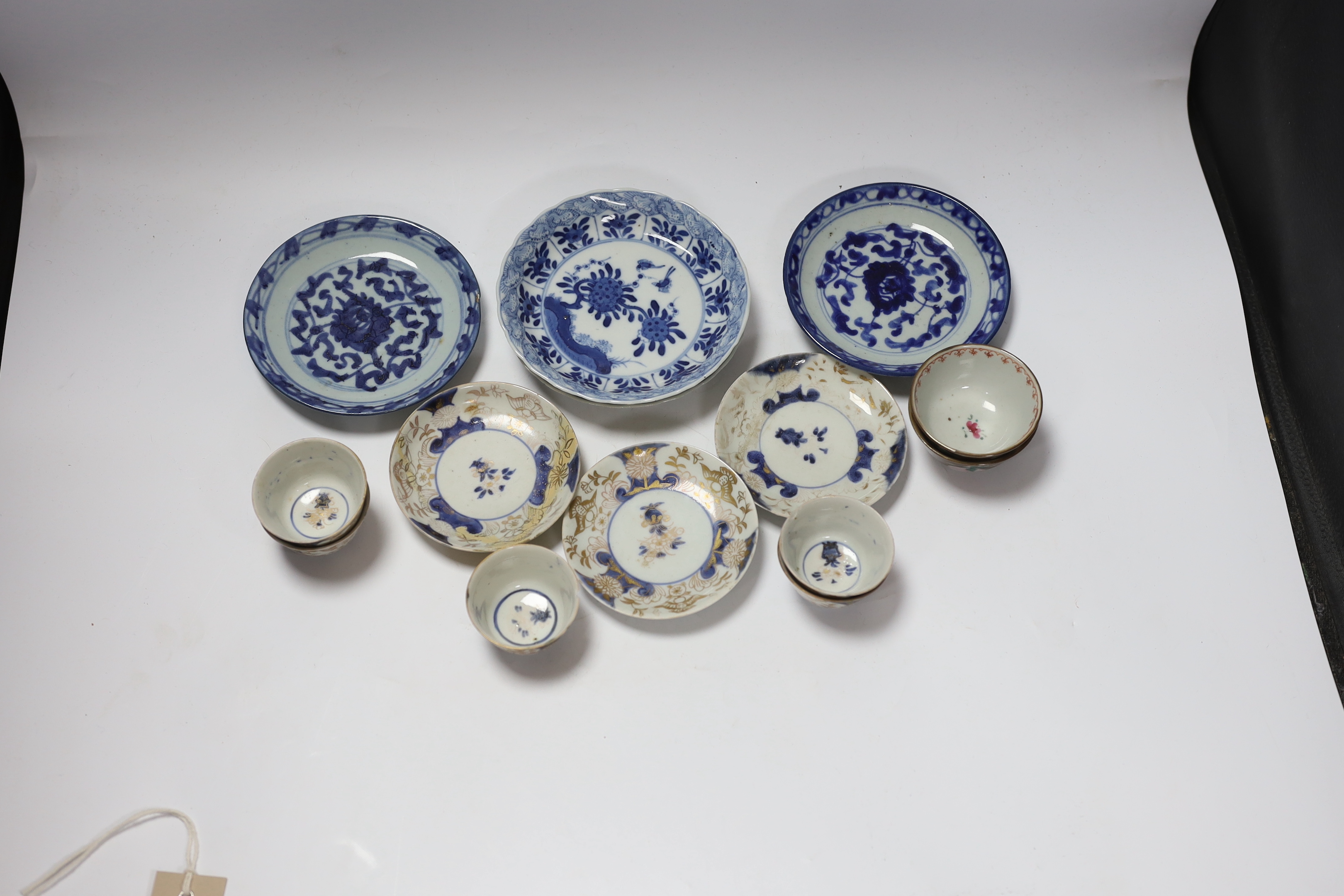 Four 18th century Japanese teabowls with three matching saucers, two 19th century Chinese cafe au lait glazed teabowls and four Chinese blue and white small dishes